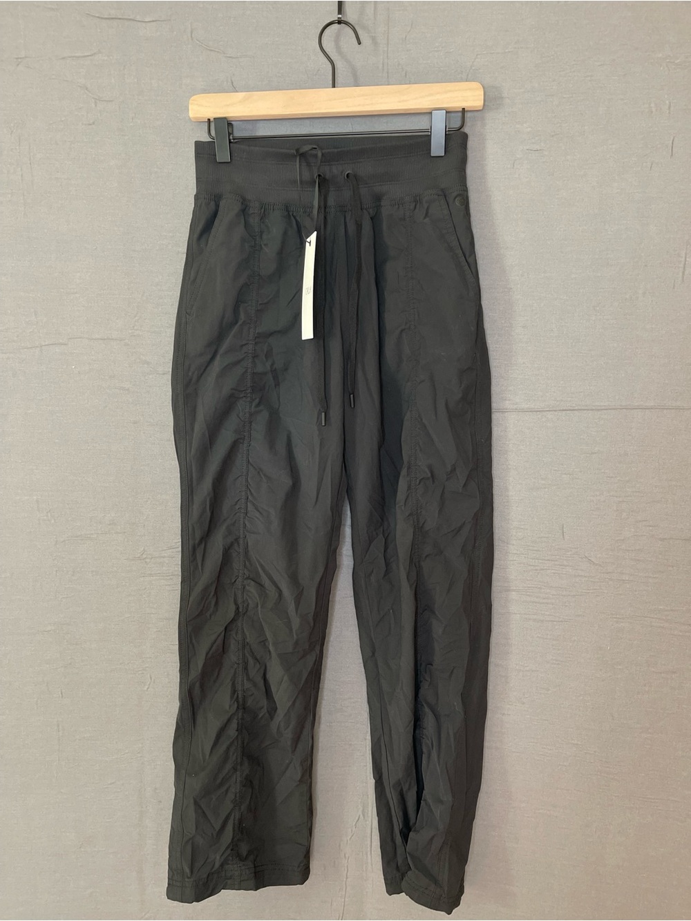 NWT CALIA Women’s XS Nyluxe Mid-Rise Cinch Pant Black Athleisure Outdoor Jogger